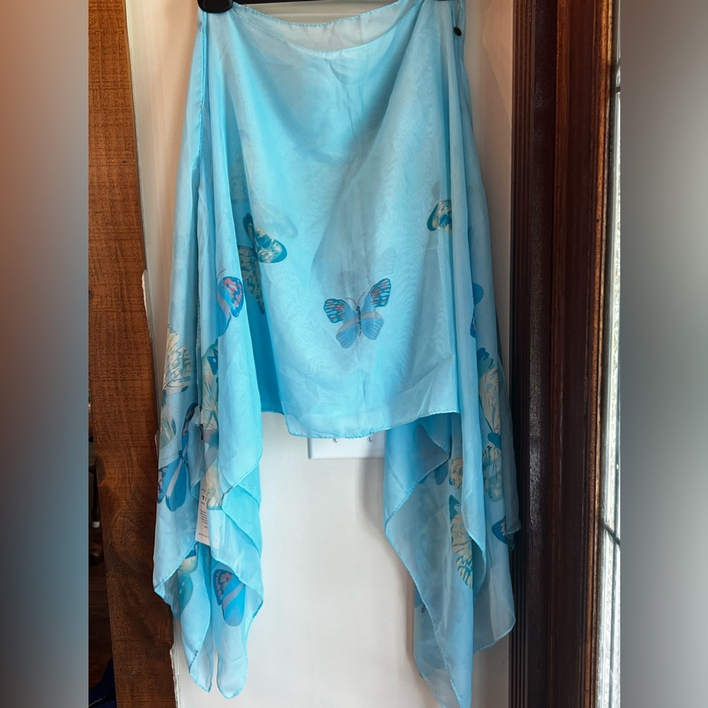 Women’s bathing suit cover up, brand new.